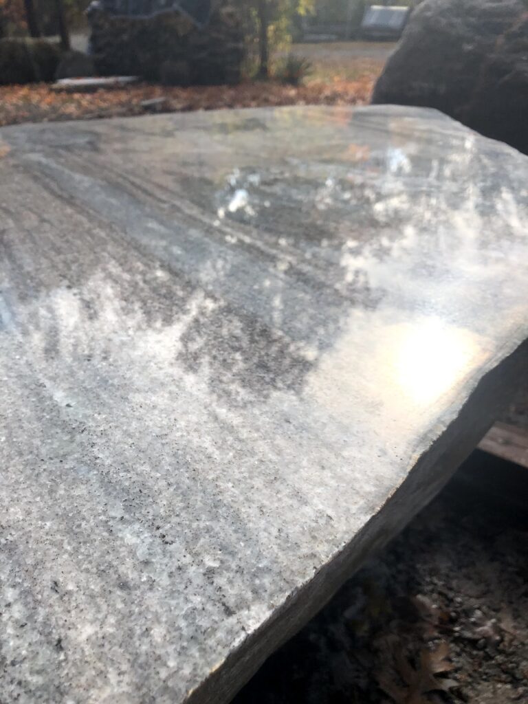 Polished stone boulder table