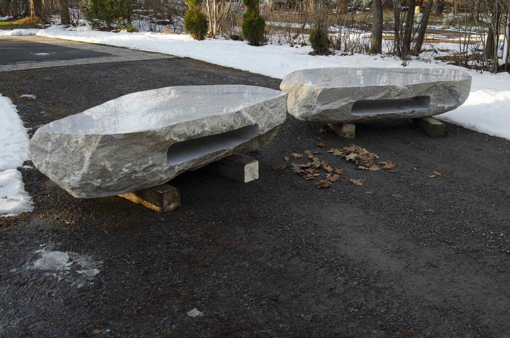 Two Polished stone boulder coffee table